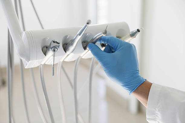 Professional Tooth Extraction technician working in Pope County County, AR